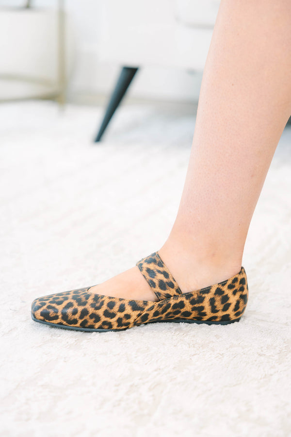 Leopard print Mary Jane flats with a buckle strap and square toe.
