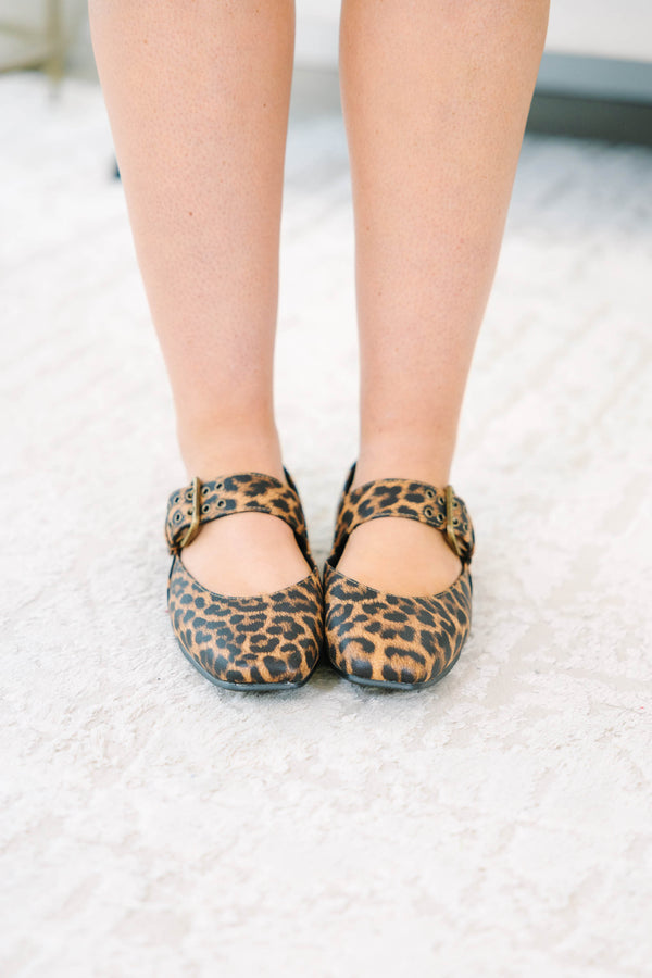 Leopard print Mary Jane flats with a buckle strap and square toe.