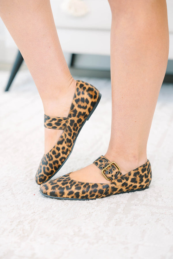 Leopard print Mary Jane flats with a buckle strap and square toe.