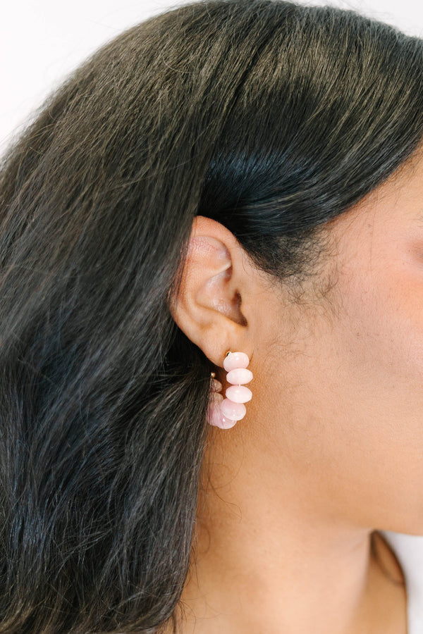 Plus Size pink resin bead hoop earrings with gold-tone hardware.