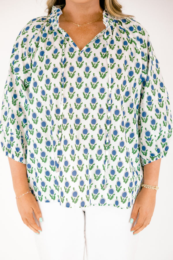 Chic Soul plus size clothing, white top with half bubble sleeves  slight v-neckline and a blue and green floral block pattern throughout