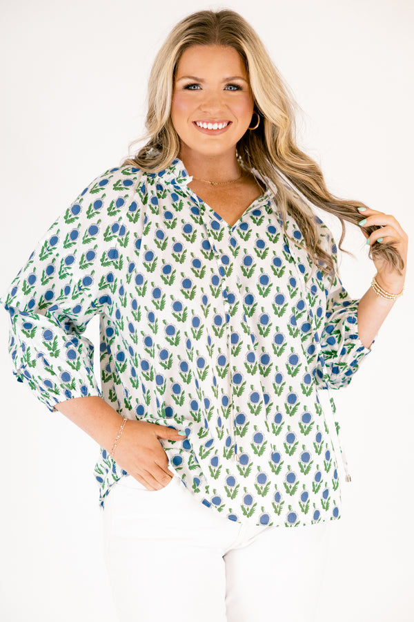 Chic Soul plus size clothing, white top with half bubble sleeves  slight v-neckline and a blue and green floral block pattern throughout