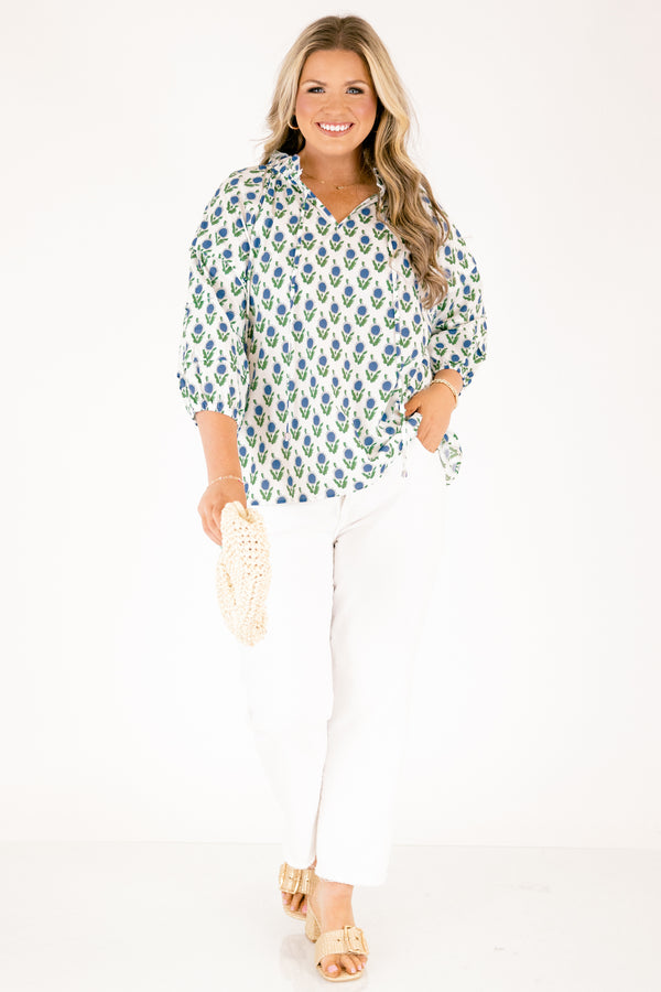 Chic Soul plus size clothing, white top with half bubble sleeves  slight v-neckline and a blue and green floral block pattern throughout