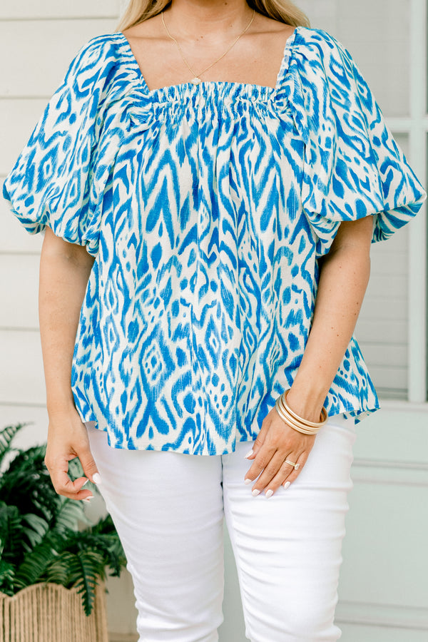 Chic Soul plus size clothing, Blue and white top with an abstract pattern and bubble sleeves 
