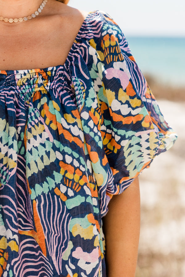 Chic Soul plus size clothing, short-puffed-sleeve navy top with a square-neckline and a multi-colored tropical abstract pattern 