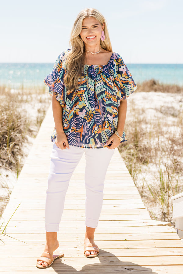 Chic Soul plus size clothing, short-puffed-sleeve navy top with a square-neckline and a multi-colored tropical abstract pattern 