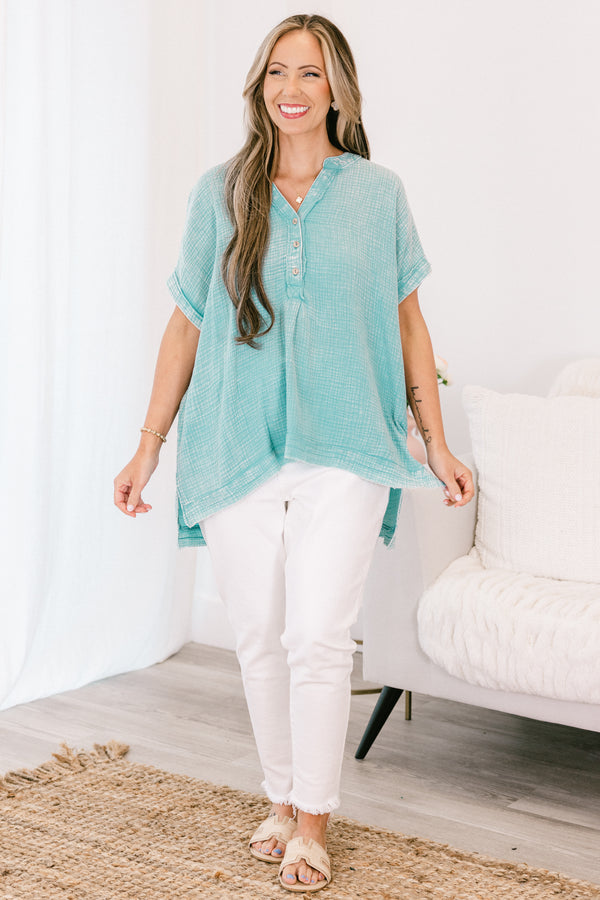 Chic Soul plus size clothing, short-sleeve cuffed dusty teal green mineral washed top with a buttoned v-neckline and a high-low hemline