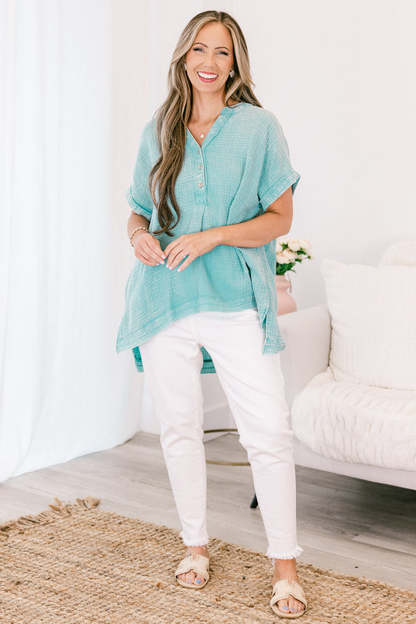 Chic Soul plus size clothing, short-sleeve cuffed dusty teal green mineral washed top with a buttoned v-neckline and a high-low hemline