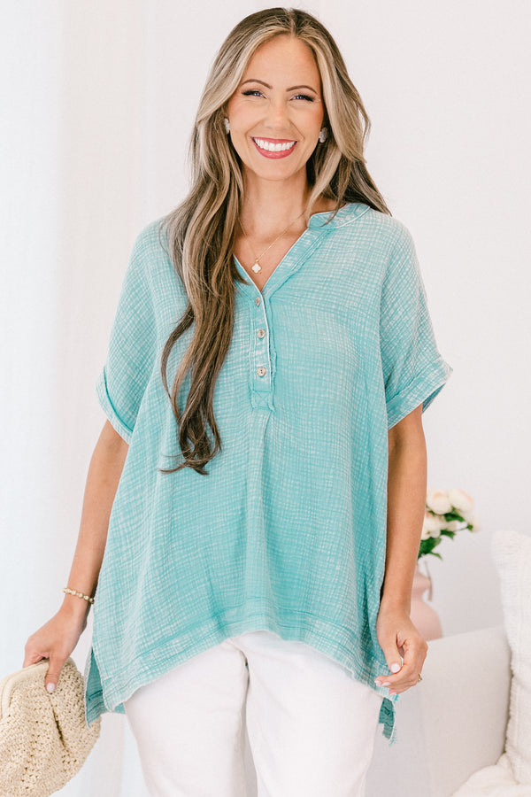 Chic Soul plus size clothing, short-sleeve cuffed dusty teal green mineral washed top with a buttoned v-neckline and a high-low hemline