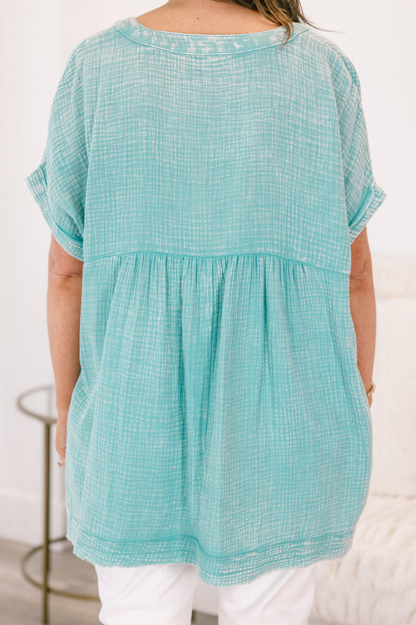 Chic Soul plus size clothing, short-sleeve cuffed dusty teal green mineral washed top with a buttoned v-neckline and a high-low hemline
