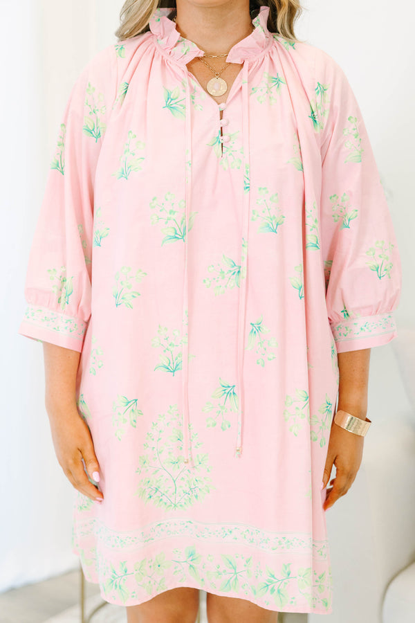 Plus size pink botanical print dress with ruffle split neckline and balloon 3/4 sleeves.