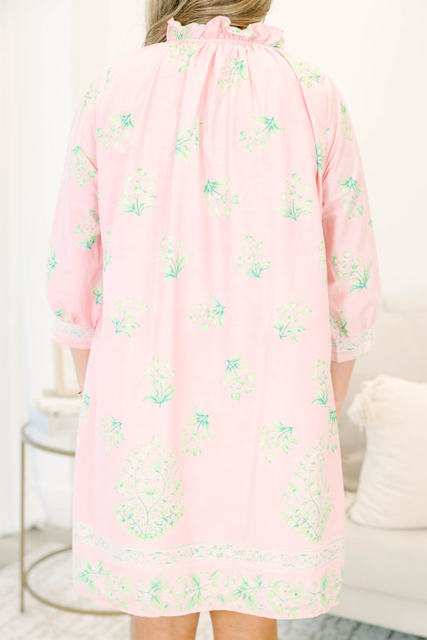 Plus size pink botanical print dress with ruffle split neckline and balloon 3/4 sleeves.