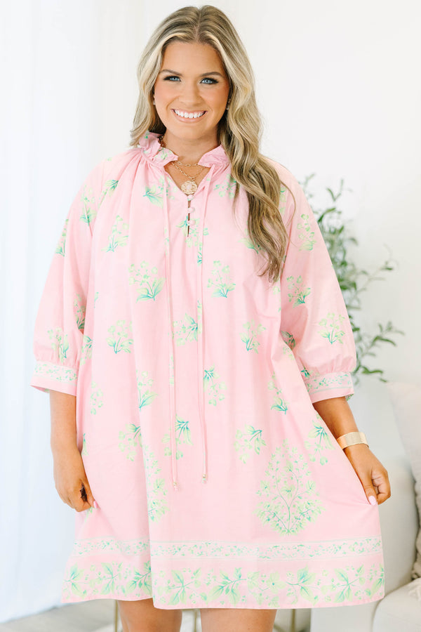 Plus size pink botanical print dress with ruffle split neckline and balloon 3/4 sleeves.