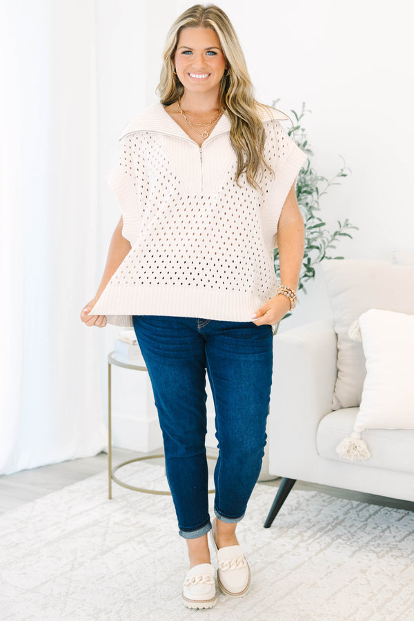 Plus Size taupe knit sweater with a quarter-zip collar, short sleeves, and open-stitch pattern.
