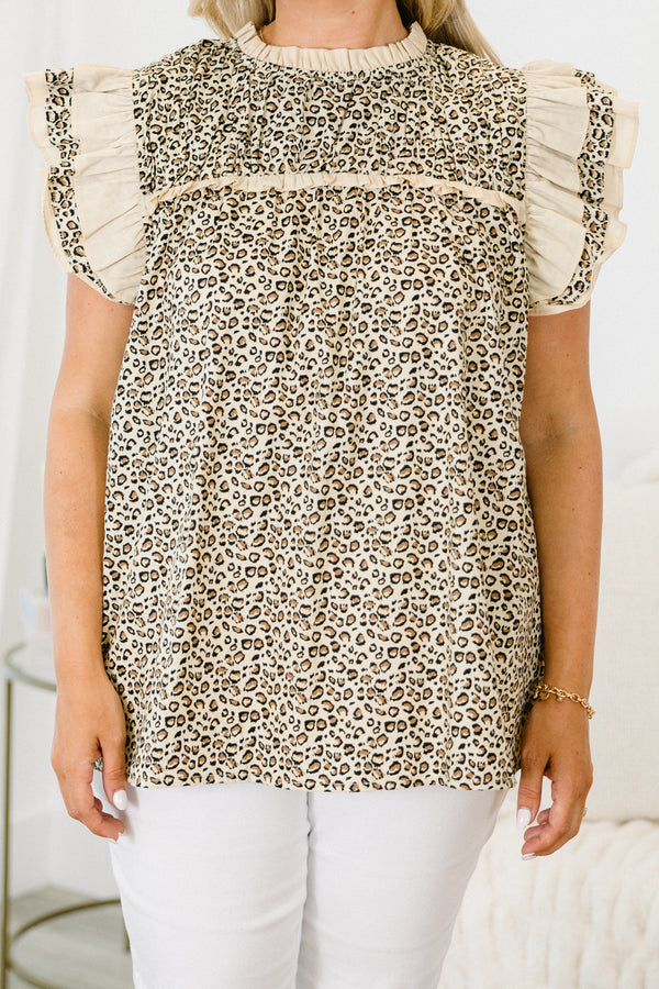 Chic Soul plus size clothing, leopard top with a high neckline and flutter sleeves that have a white ruffle detail on the tops of each sleeve 