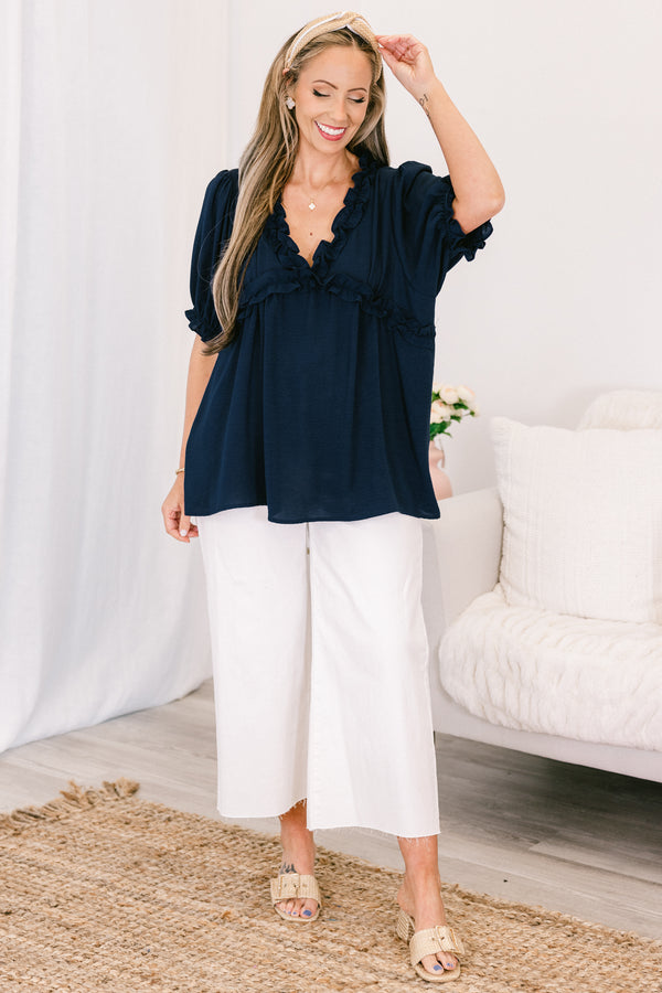 Chic soul plus size clothing, navy top with a v-neck and ruffles at the end of the sleeves and along the neckline 