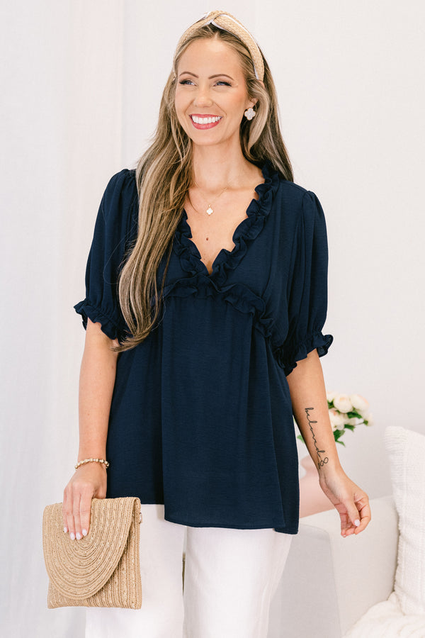 Chic soul plus size clothing, navy top with a v-neck and ruffles at the end of the sleeves and along the neckline 