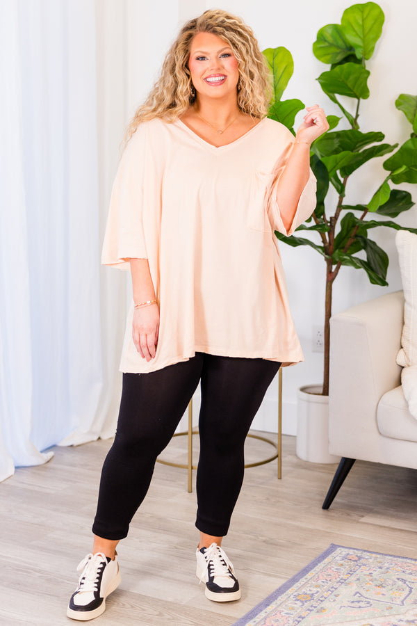 Chic Soul plus size clothing, cream peach top with short sleeves, v-neckline, and left chest pocket