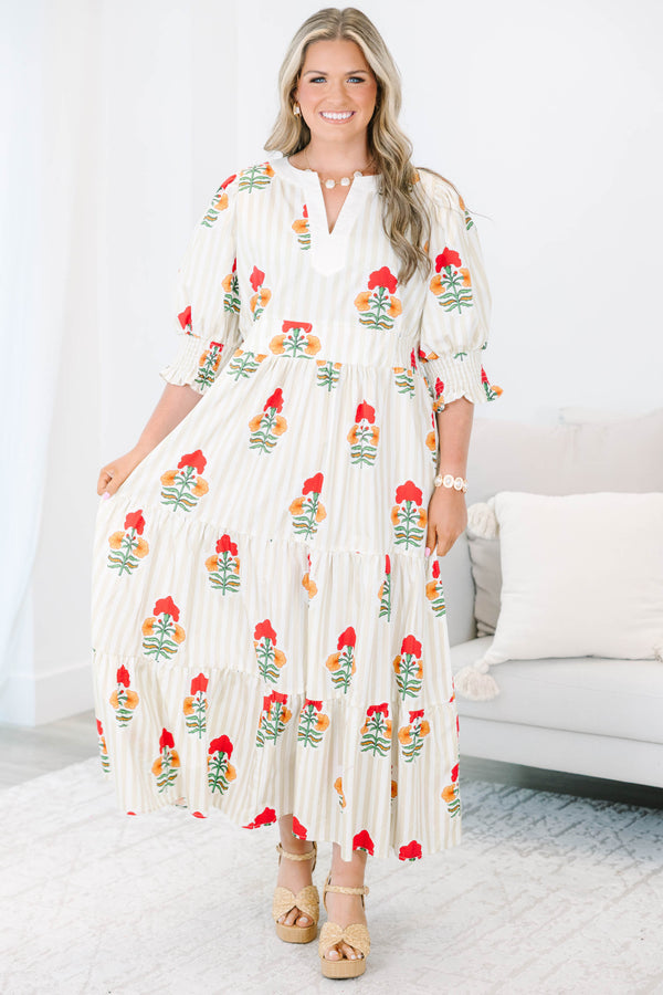Plus Size cream tiered maxi dress with vertical stripes, red floral print, and smocked puff sleeves.