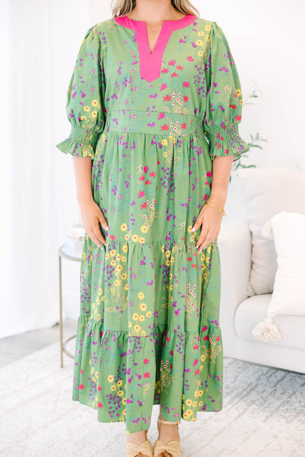 Plus Size green floral tiered maxi dress with pink V-neck trim and ruffled puff sleeves.