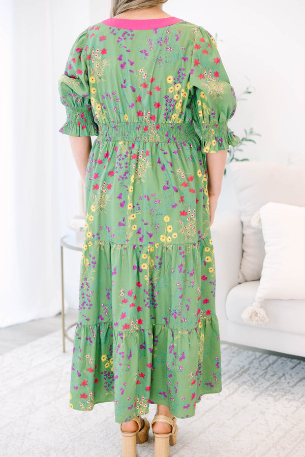 Plus Size green floral tiered maxi dress with pink V-neck trim and ruffled puff sleeves.