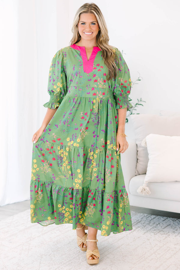 Plus Size green floral tiered maxi dress with pink V-neck trim and ruffled puff sleeves.