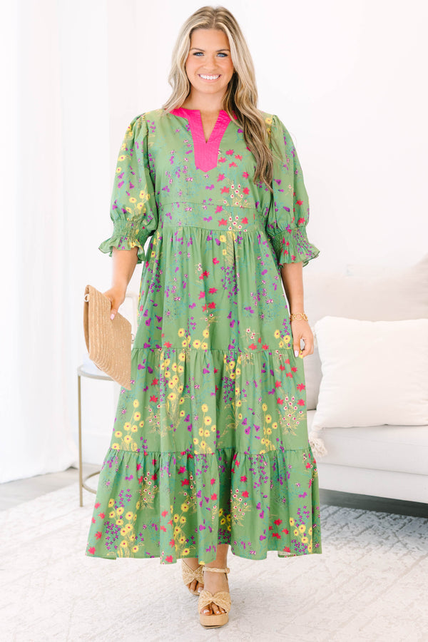 Plus Size green floral tiered maxi dress with pink V-neck trim and ruffled puff sleeves.