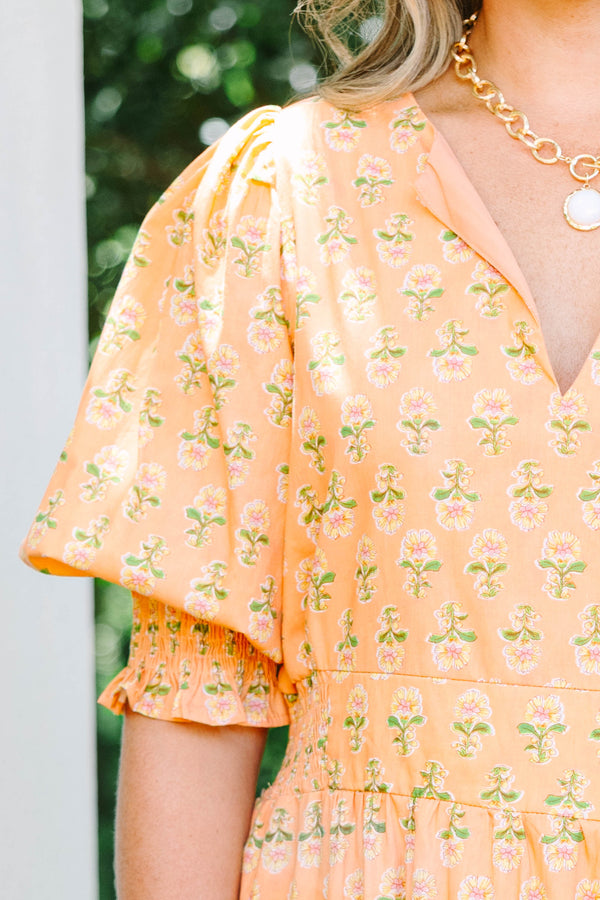 Plus Size rust floral tiered maxi dress with a v-neck, smocked puff sleeves, and a flowy fit.