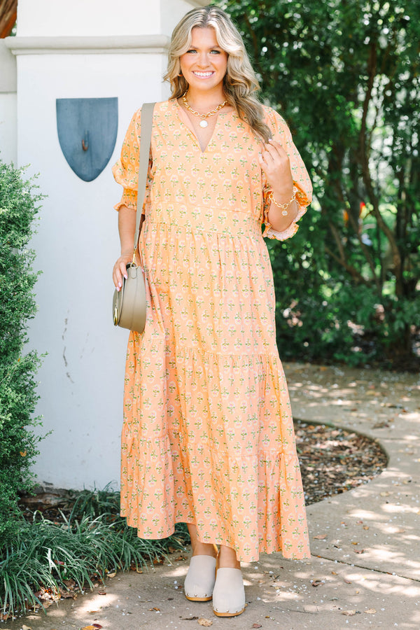 Plus Size rust floral tiered maxi dress with a v-neck, smocked puff sleeves, and a flowy fit.