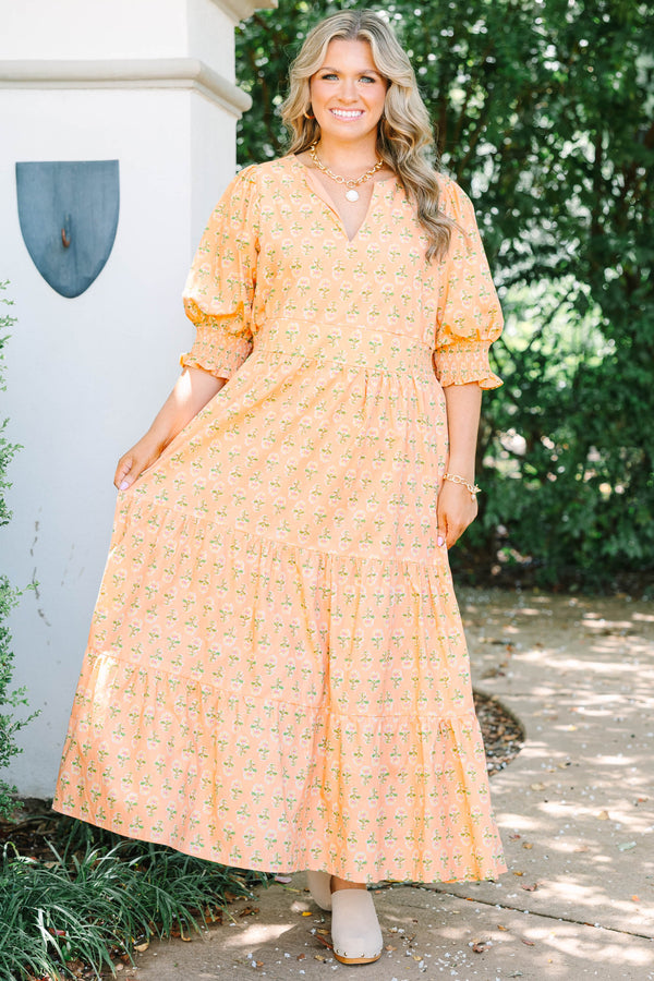 Plus Size rust floral tiered maxi dress with a v-neck, smocked puff sleeves, and a flowy fit.