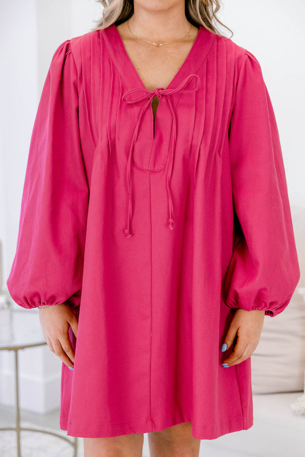 Plus Size fuchsia cotton v-neck dress with pleated front, tie detail, and elastic balloon sleeves.