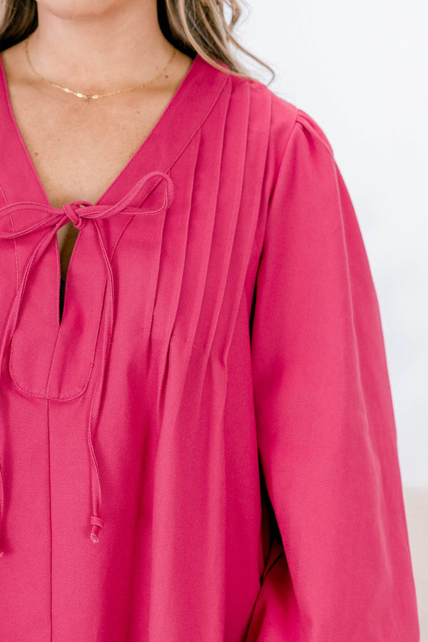 Plus Size fuchsia cotton v-neck dress with pleated front, tie detail, and elastic balloon sleeves.