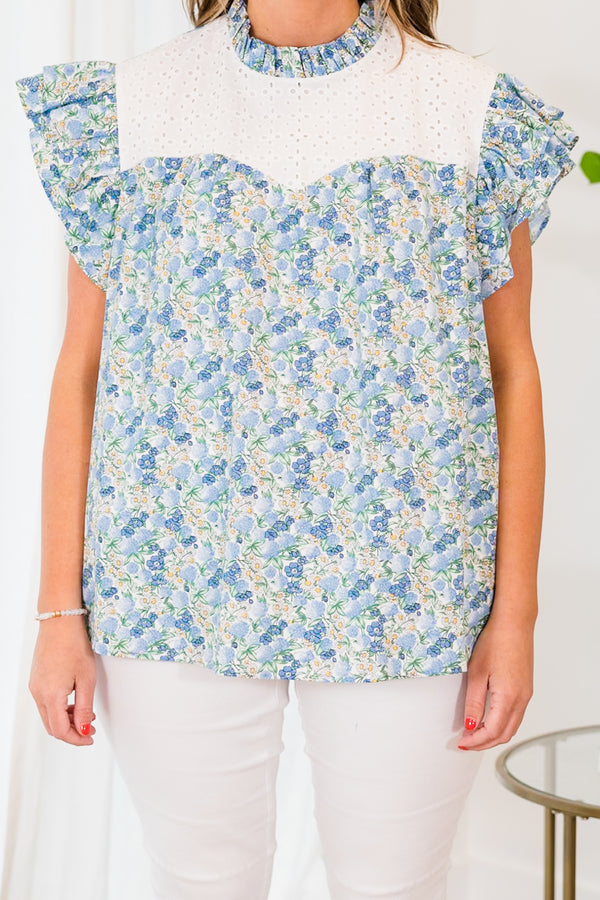 Chic Soul plus size clothing, blue floral short sleeve top with ruffle sleeves and white eyelet chest detailing