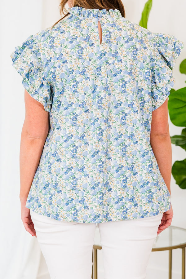 Chic Soul plus size clothing, blue floral short sleeve top with ruffle sleeves and white eyelet chest detailing