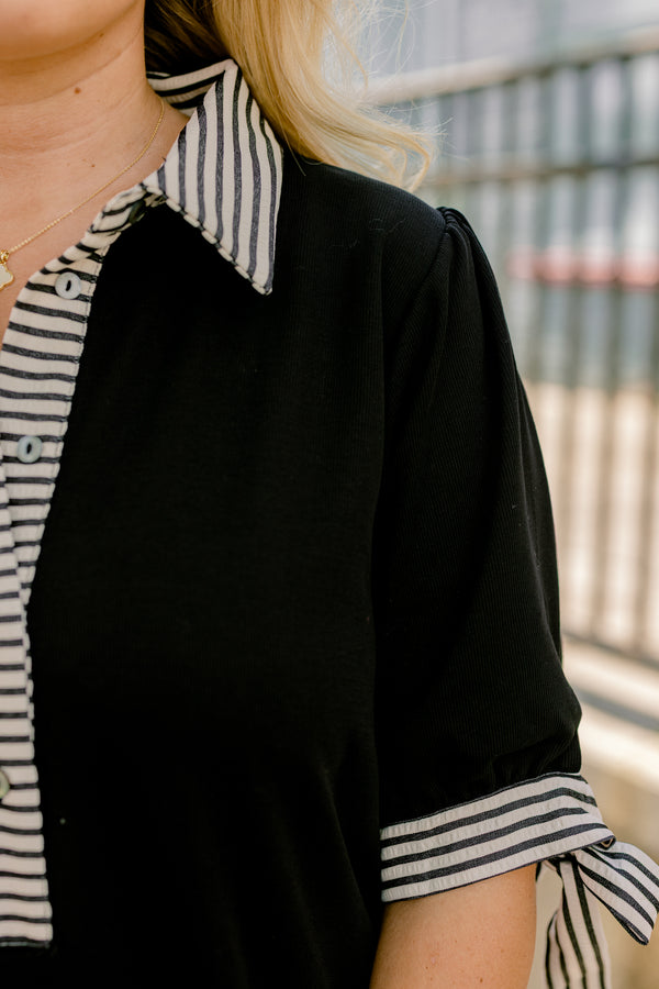 Chic Soul plus size clothing, black short sleeve v neckline dress with white and thin black horizontal stripes lining the neckline and the sleeves, tying them in a bow