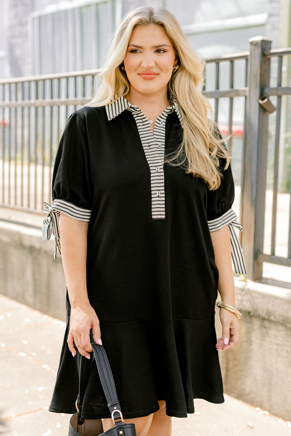 Chic Soul plus size clothing, black short sleeve v neckline dress with white and thin black horizontal stripes lining the neckline and the sleeves, tying them in a bow