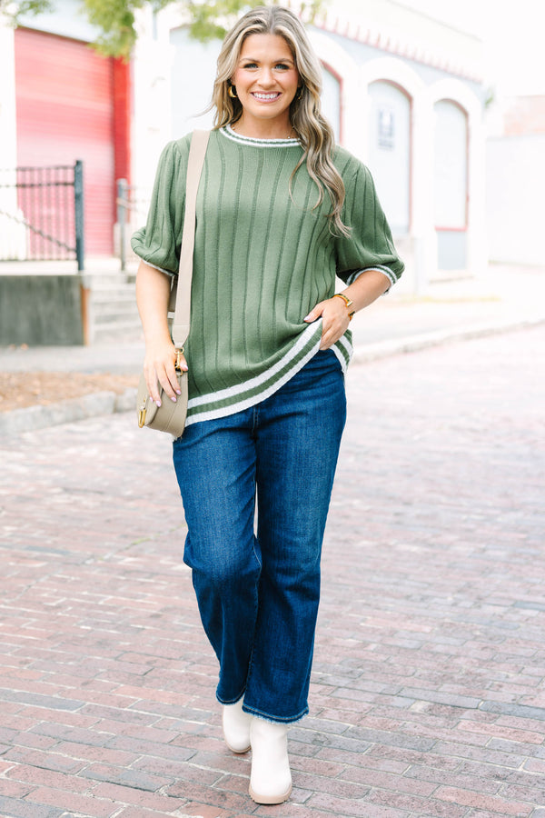 Plus Size olive green ribbed knit sweater top with white striped trim on the neck, sleeves and hem.