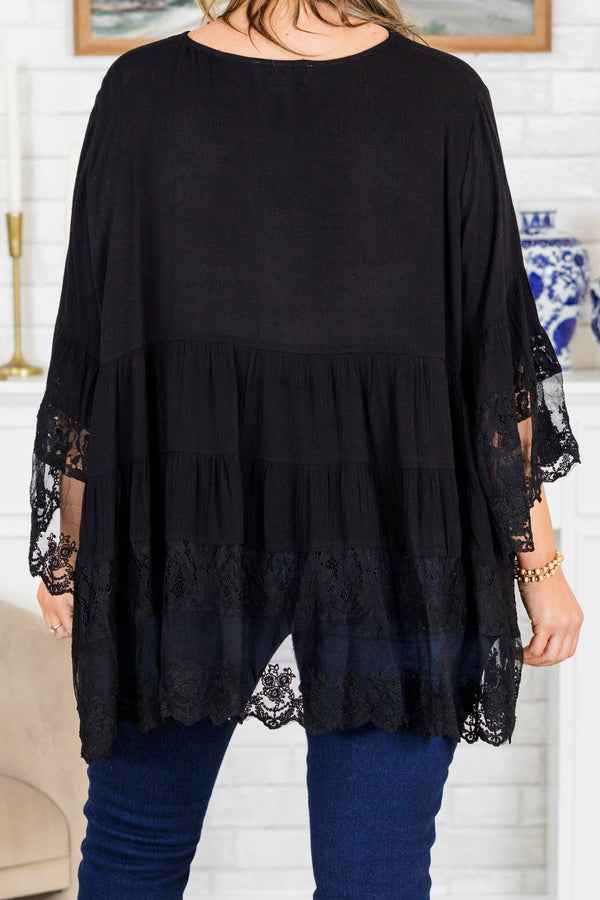 Plus Size black button-down blouse with tiered lace trim and wide lace-cuffed sleeves.
