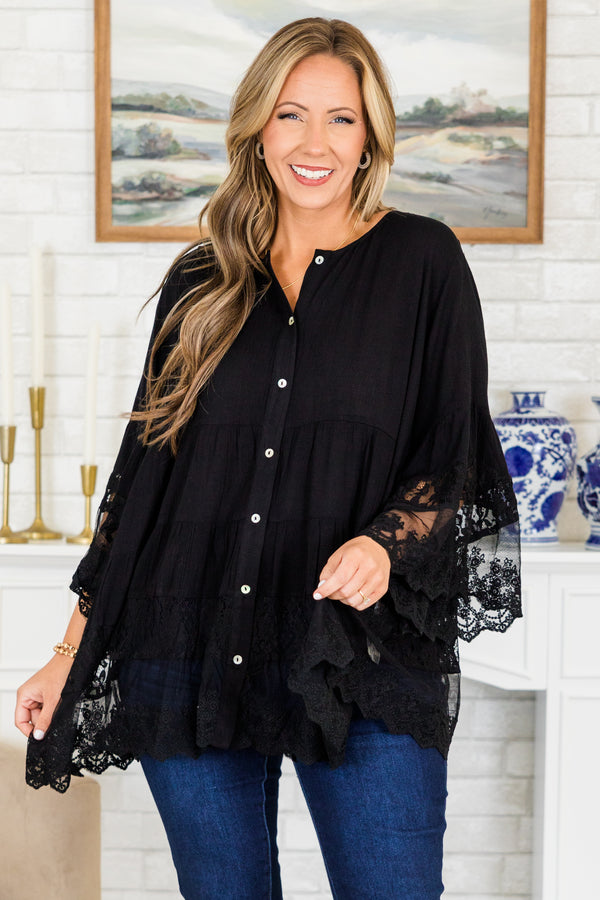 Plus Size black button-down blouse with tiered lace trim and wide lace-cuffed sleeves.