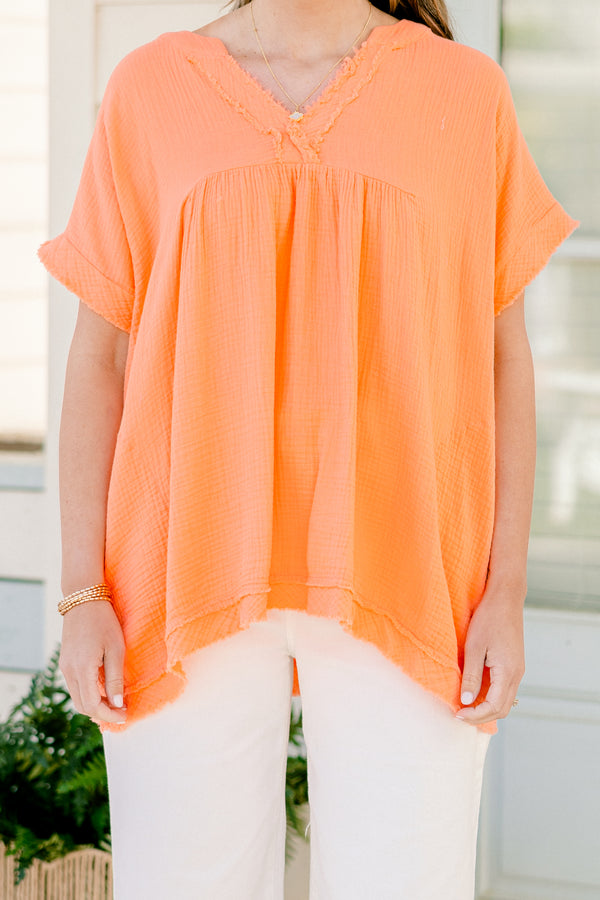 Chic Soul plus size clothing, short-sleeve distressed coral orange top with a v-neckline and a high-low distressed hemline 