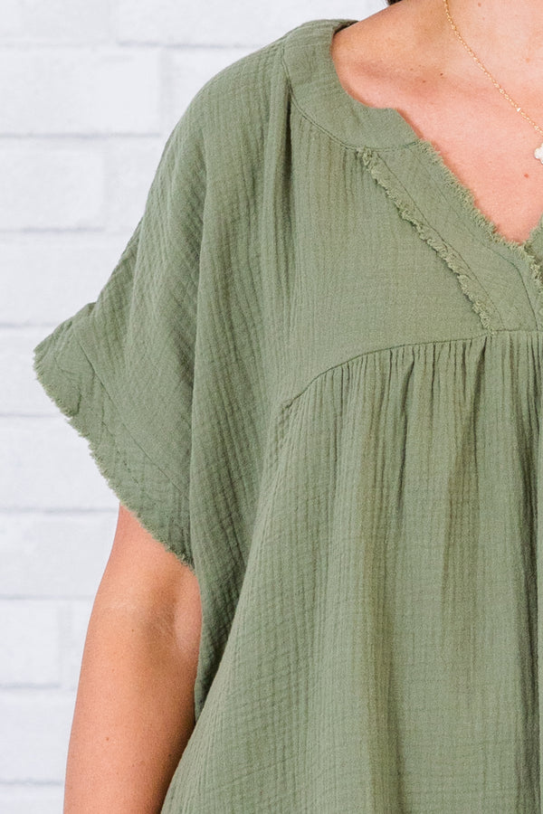 Chic Soul plus size clothing, short-sleeve distressed light olive green top with v-neckline and distressed stitching 