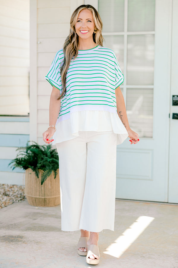 Chic Soul Plus size clothing, white short sleeve top with green stripes and a white silk ruffle detail at the end of the top 