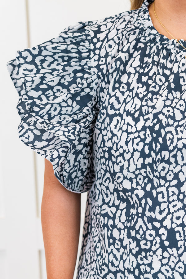 Chic Soul plus size clothing, navy leopard short sleeve top with round neckline with large ruffle flare sleeves