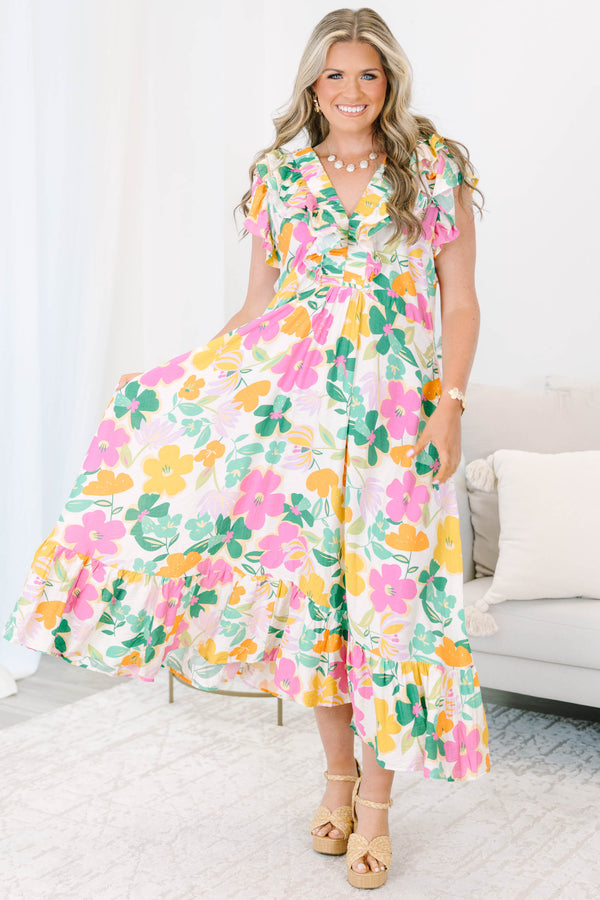 Plus size Dream Vacation Dress in a multi-color floral print with ruffle sleeves and a flowy fit.