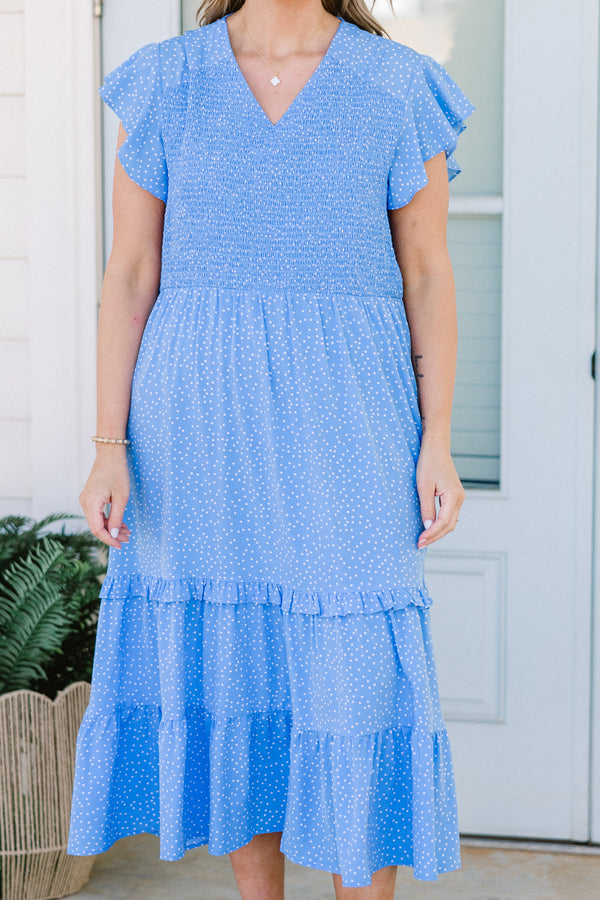Chic Soul plus size clothing, short-flutter-sleeve blue midi dress with ruffle detailing and a smocked bodice with a v-neckline and a white subtle spotted pattern 