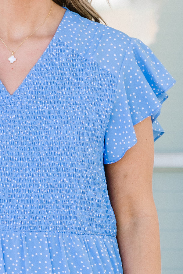 Chic Soul plus size clothing, short-flutter-sleeve blue midi dress with ruffle detailing and a smocked bodice with a v-neckline and a white subtle spotted pattern 