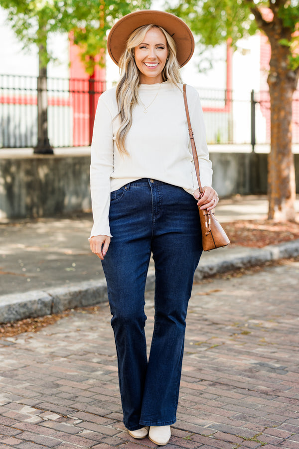 Chic Soul plus size clothing, dark wash denim jeans with flare bottom detail with stitched hem and no distressing 