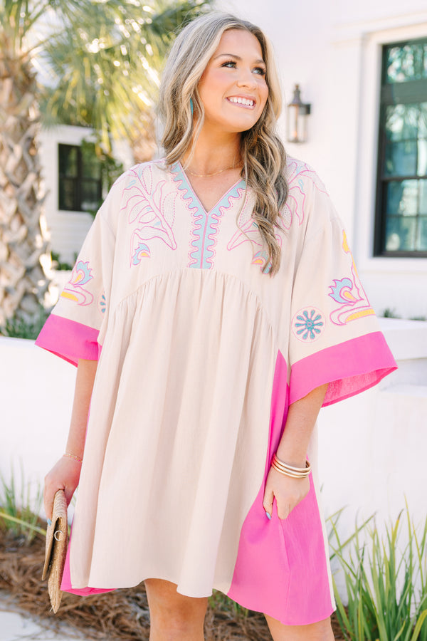 Chic Soul plus size clothing, white short sleeve mini sundress with v neckline with pink detail along bottom of sleeves with pink along the sides with yellow/blue embroidery along chest