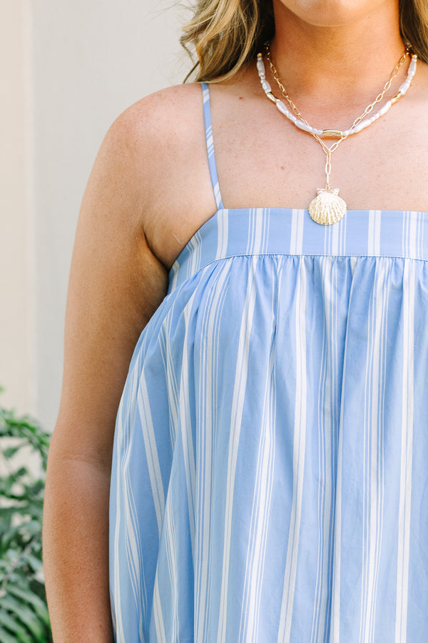 Plus Size light blue and white vertical striped maxi dress with thin straps and a square neckline.