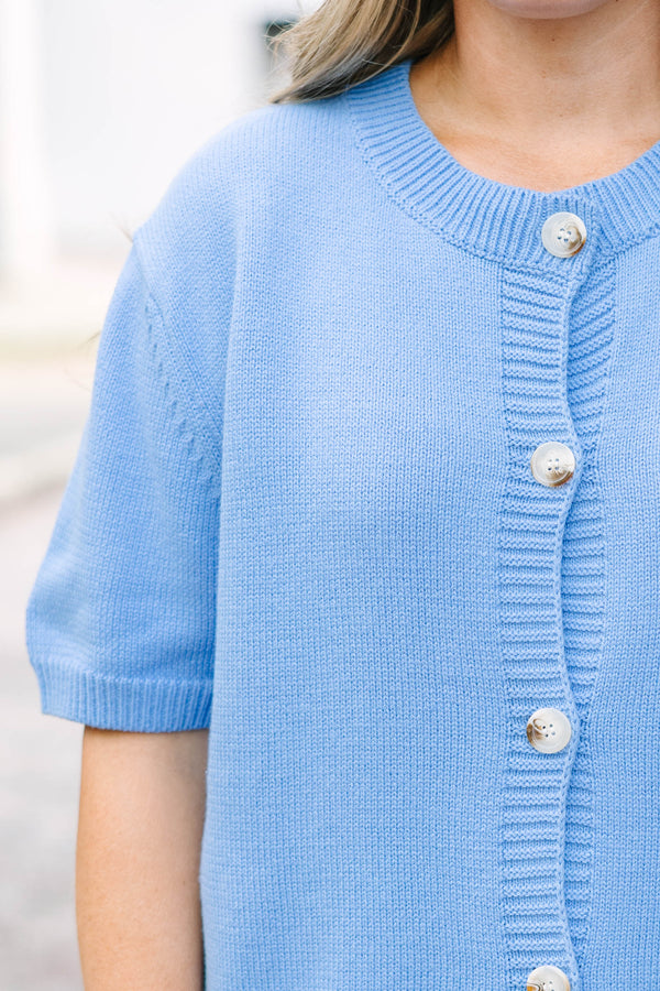 Plus Size short sleeve blue knit cardigan with functional buttons and a relaxed fit.